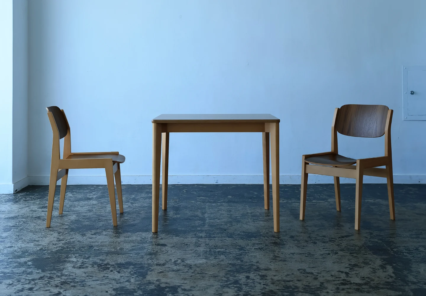 Tendo Mokko chairs and table in a bright room