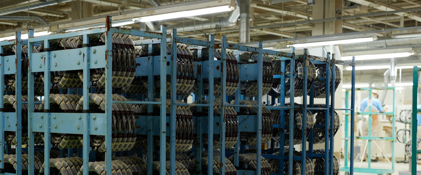 Racks of wooden parts in a Tendo Mokko workshop
