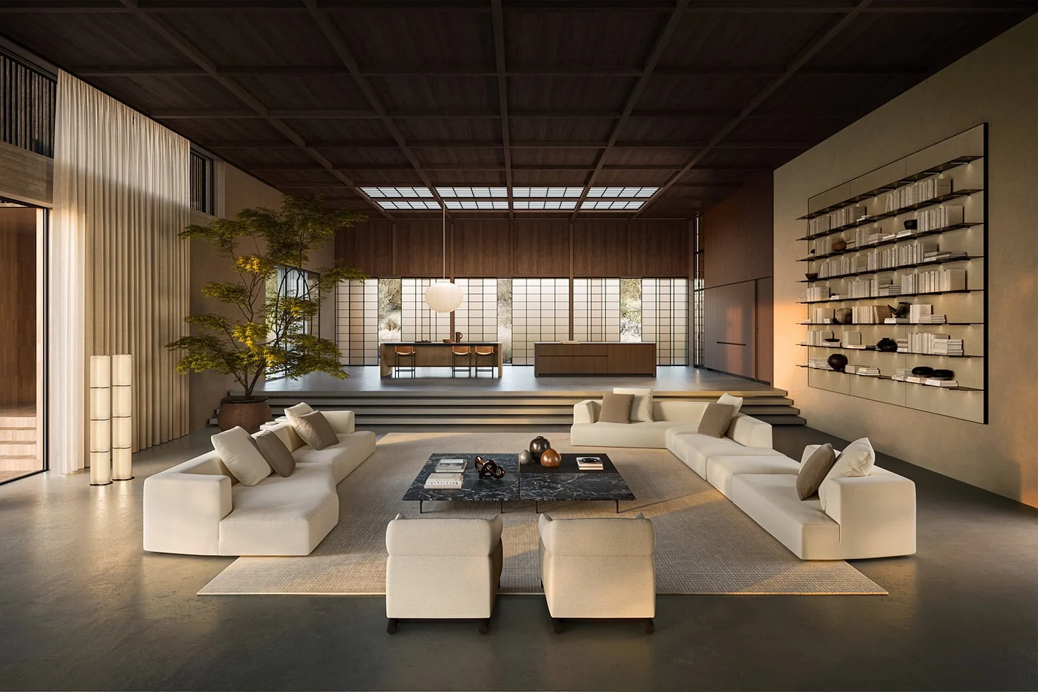 Living area with modular sofas and a long wall bookcase