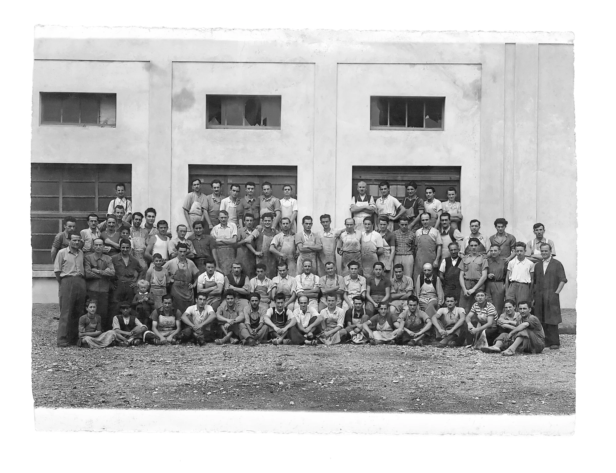 Archive photograph of the Molteni workforce outside the factory
