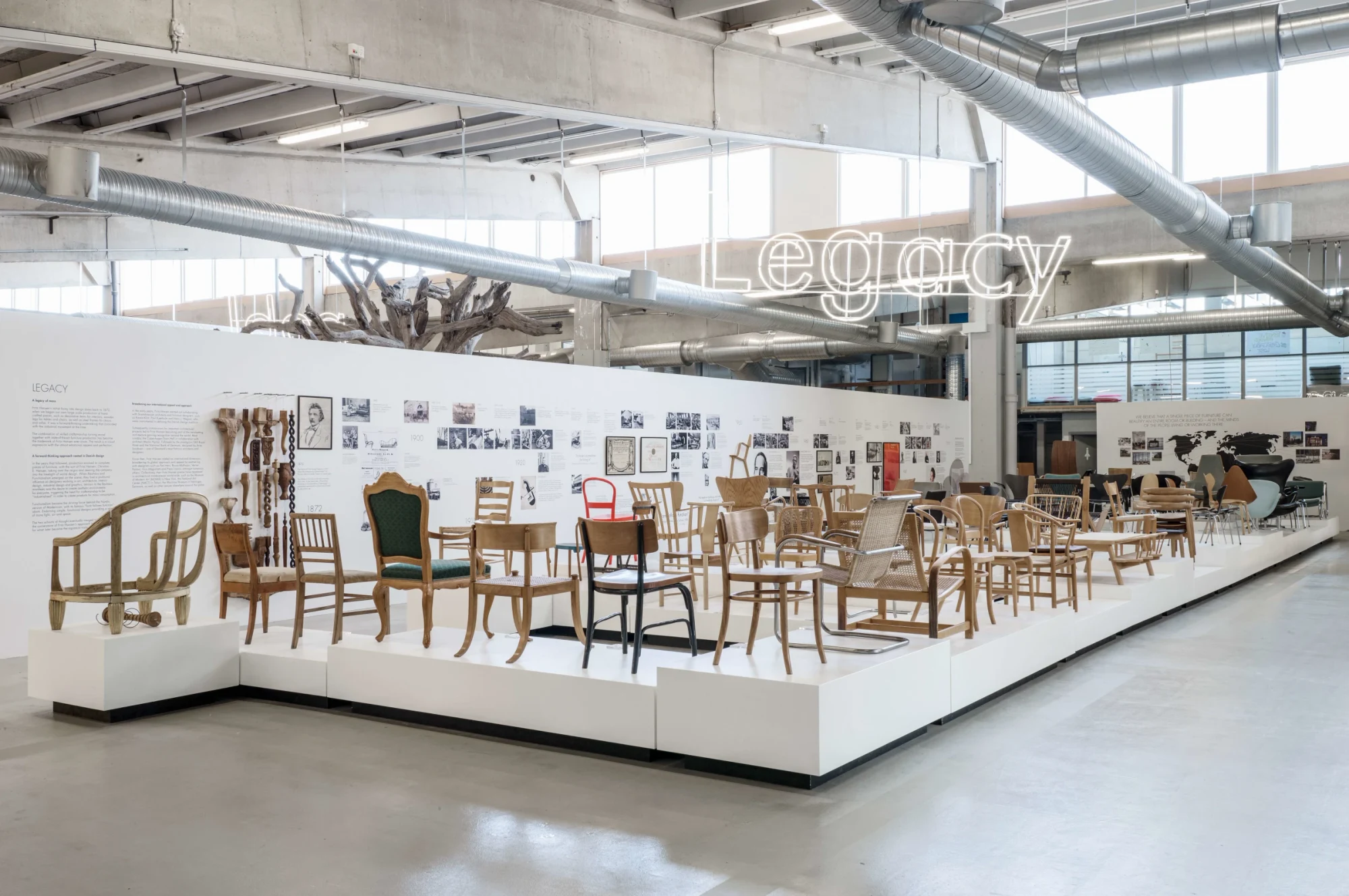 Exhibition of historic chairs in a large hall