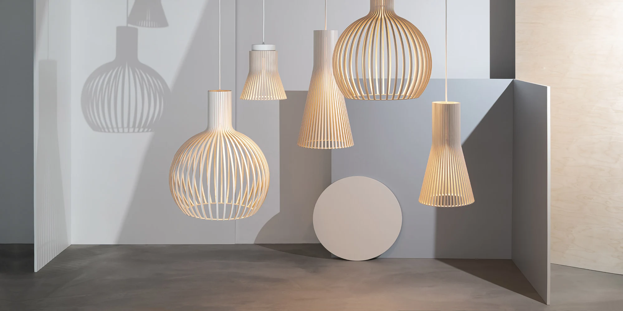 Secto Design birch pendant lamps in a studio setting