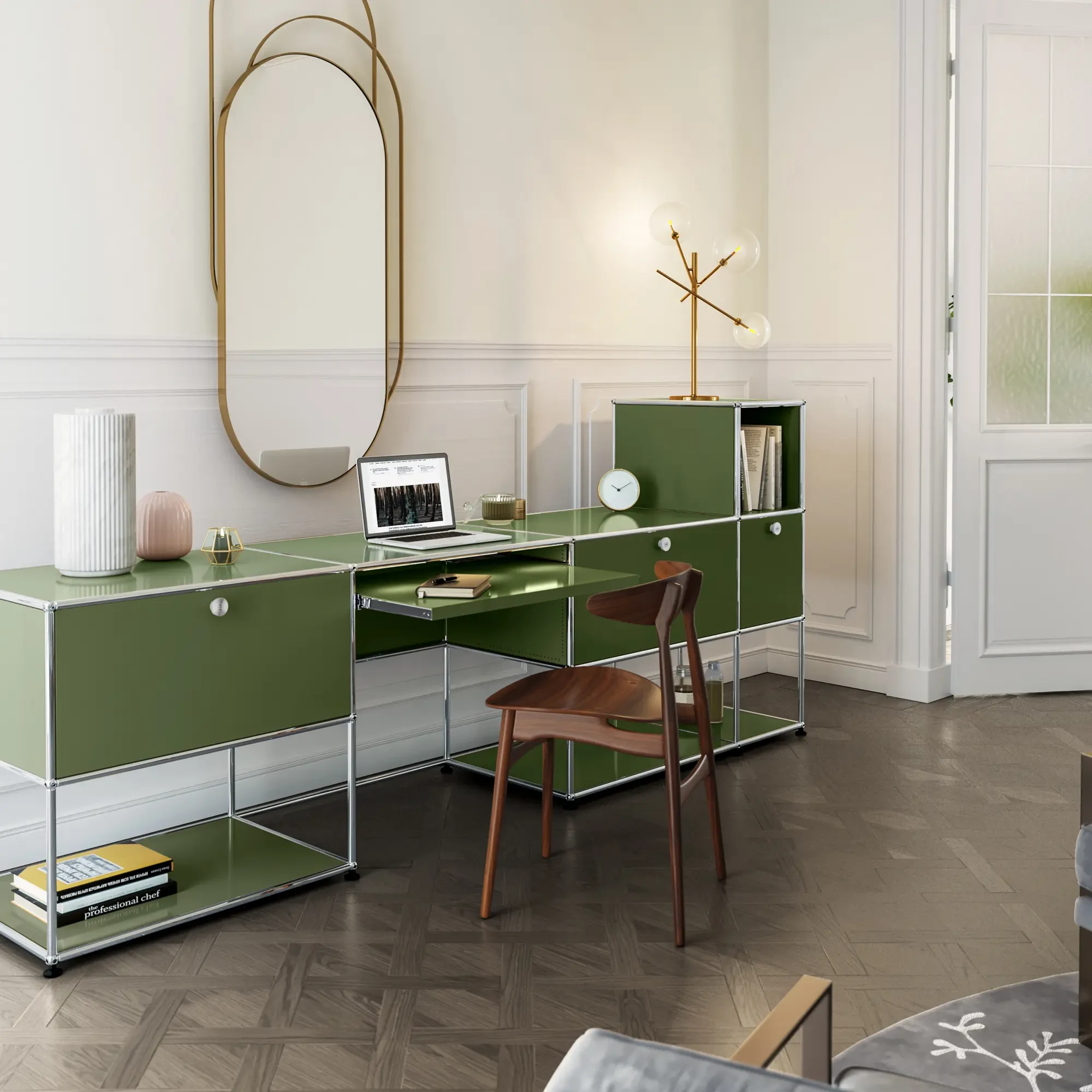 A USM desk unit in a room with an oval mirror and a chair