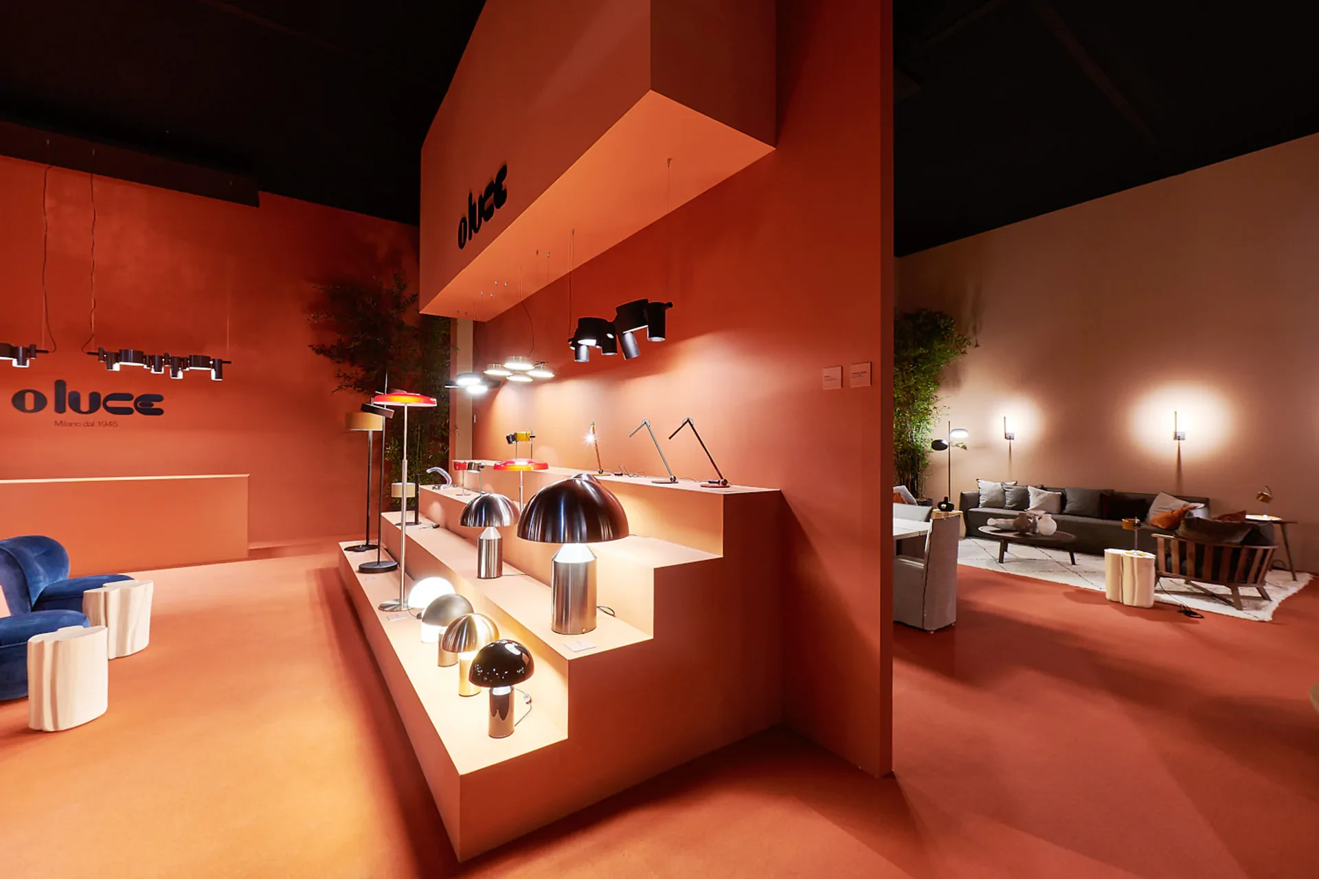 Oluce stand at Euroluce 2023 with table lamps on display