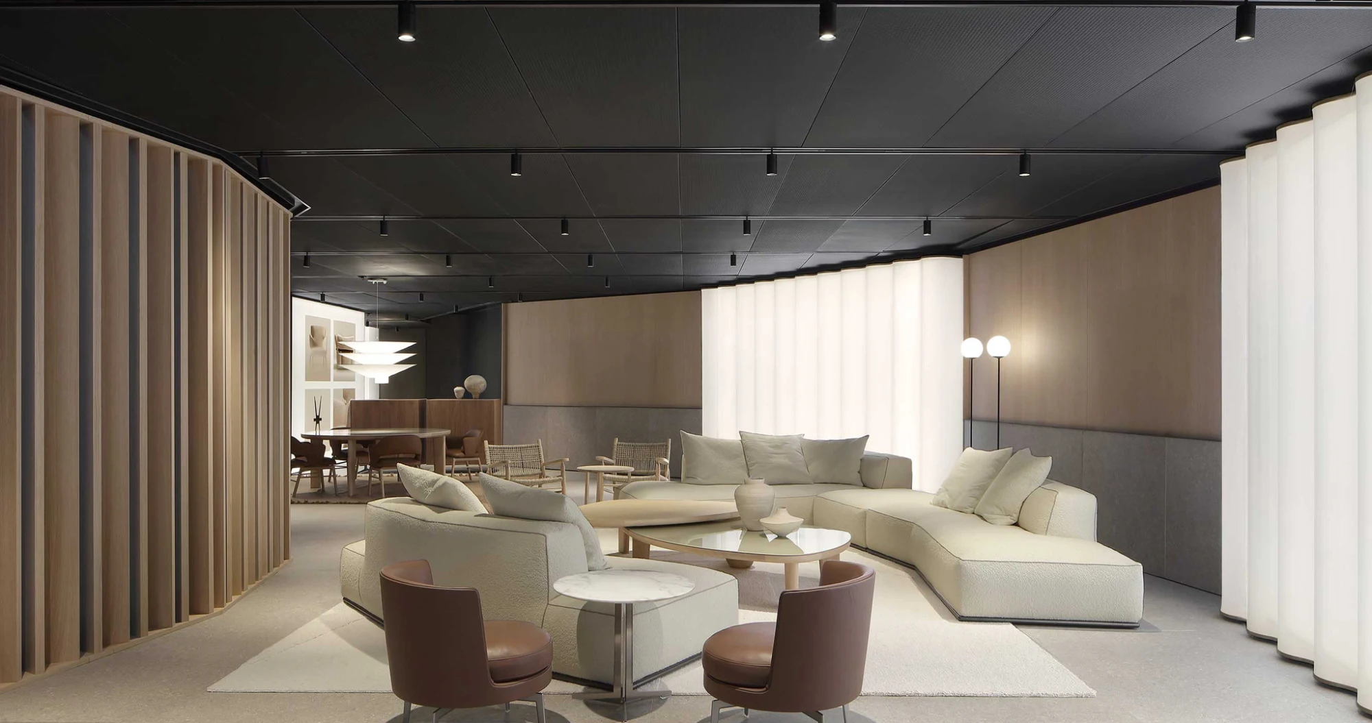 Flexform showroom in Meda with timber slats and a large seating area