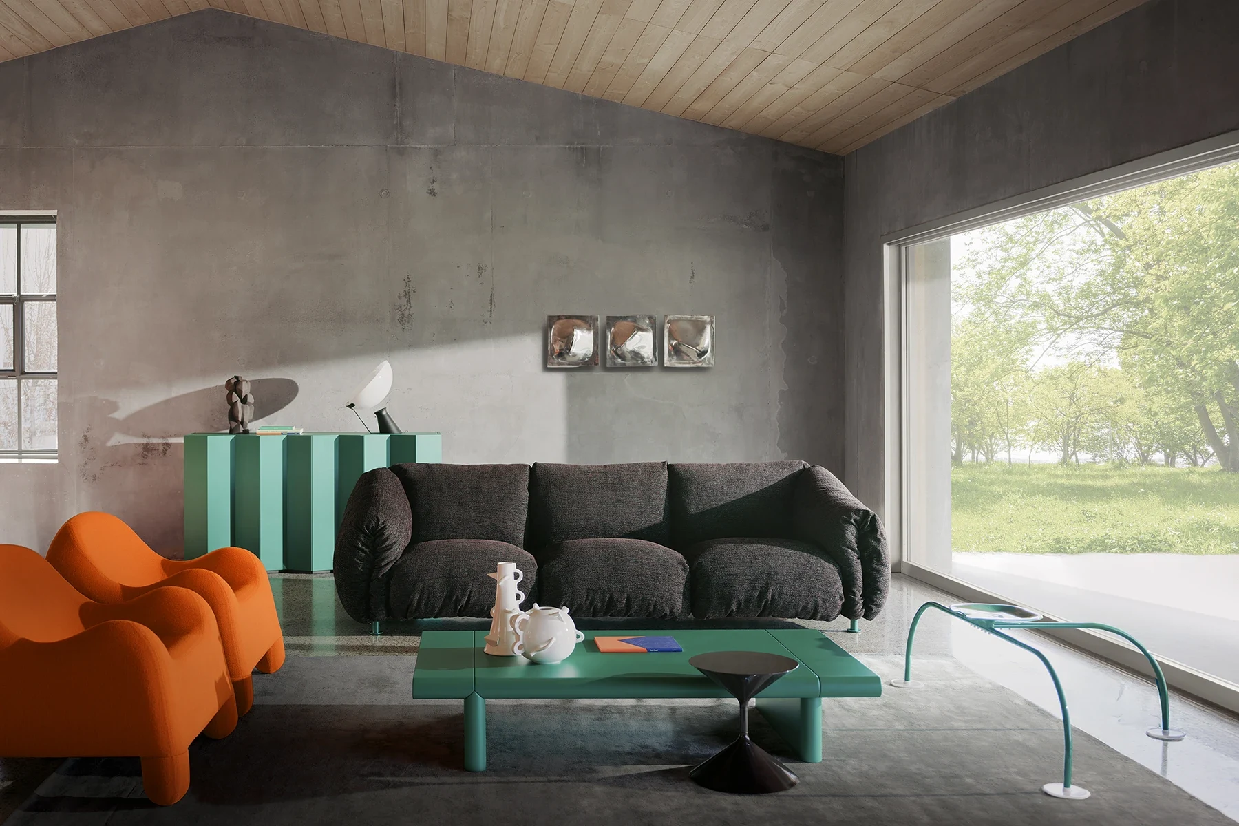 Zanotta sofas and armchairs in a concrete-walled living room