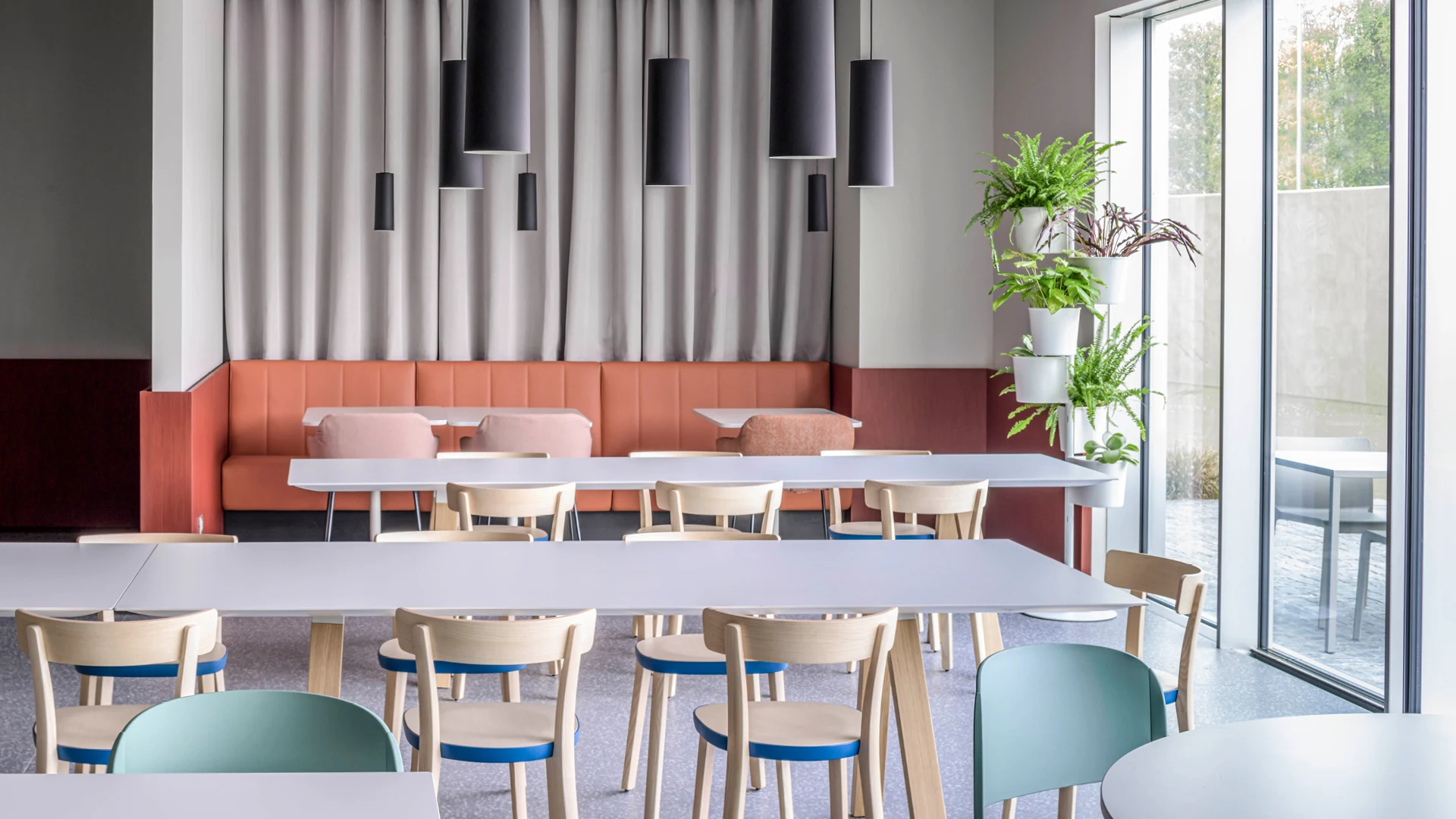Pedrali chairs and tables in a company restaurant interior