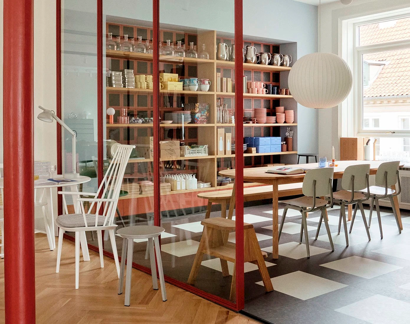 HAY House Copenhagen with tables, chairs and shelving