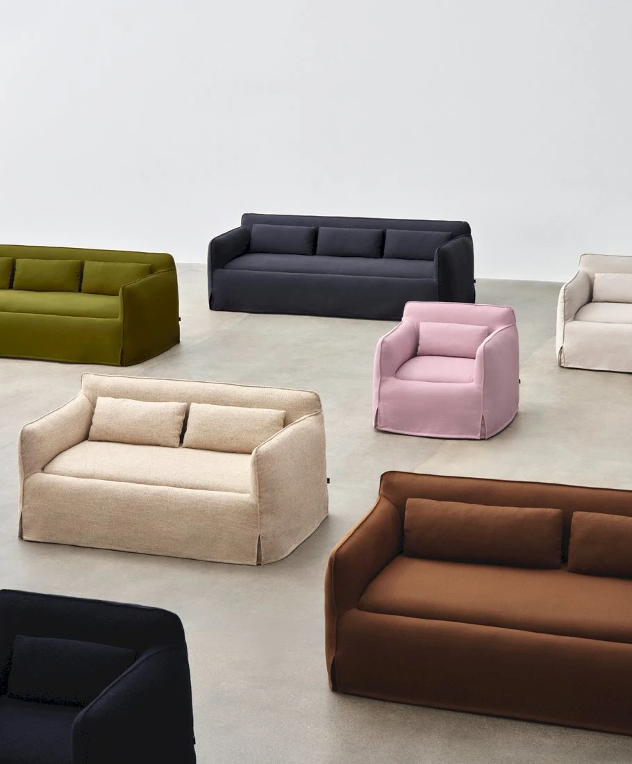 Mimi sofas and armchairs on a grey floor