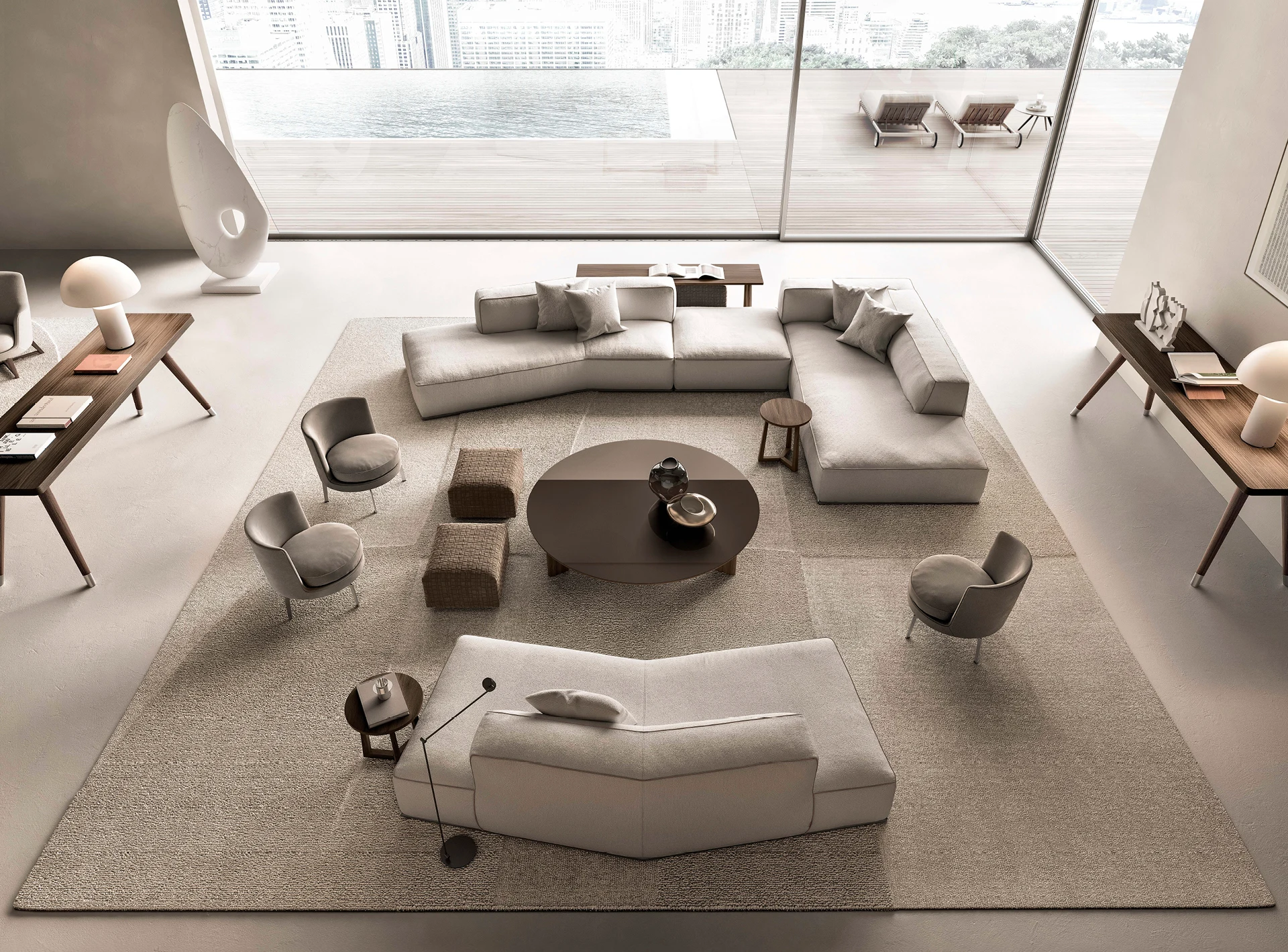 Overview from above of a living room with a Perry composition, a chaise element and armchairs