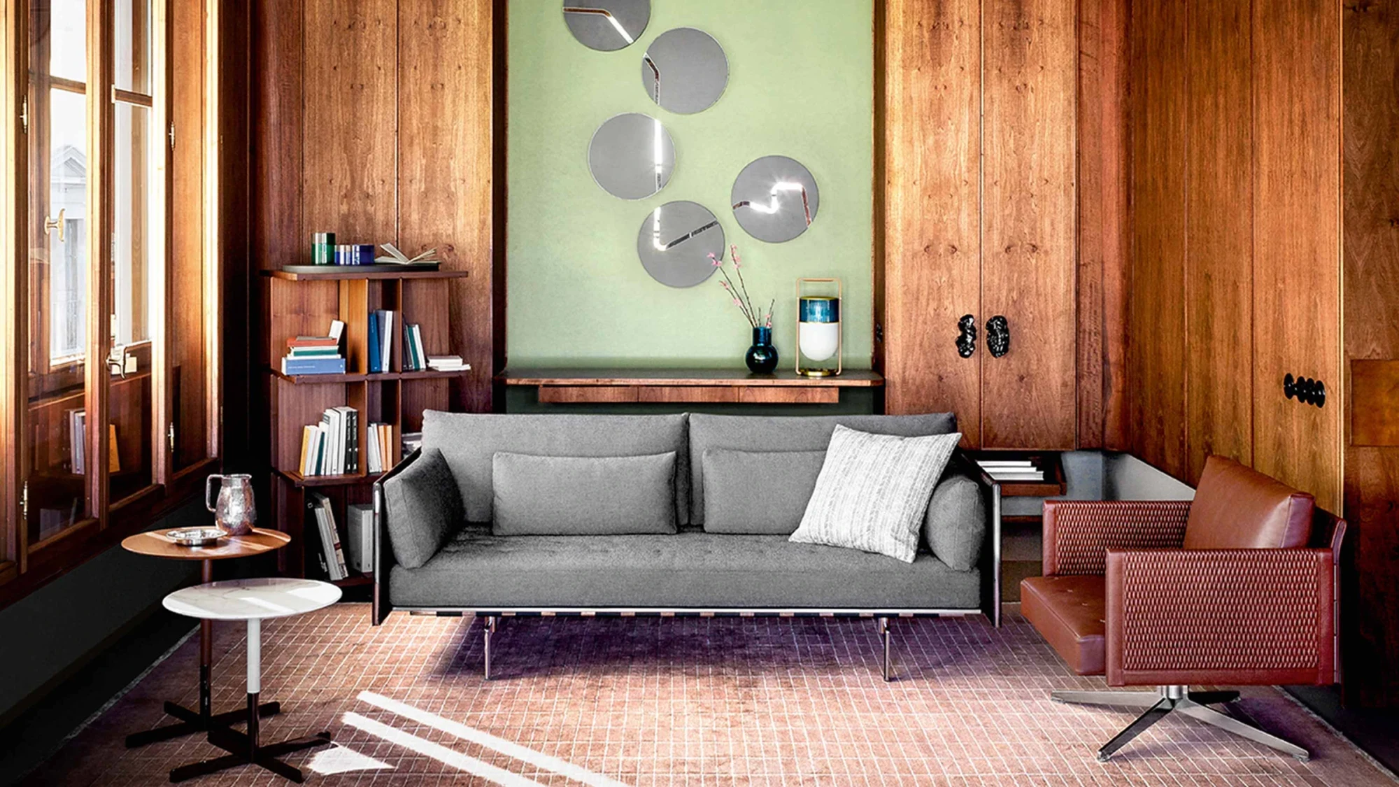 Clayton sofa and a swivel armchair in an interior setting