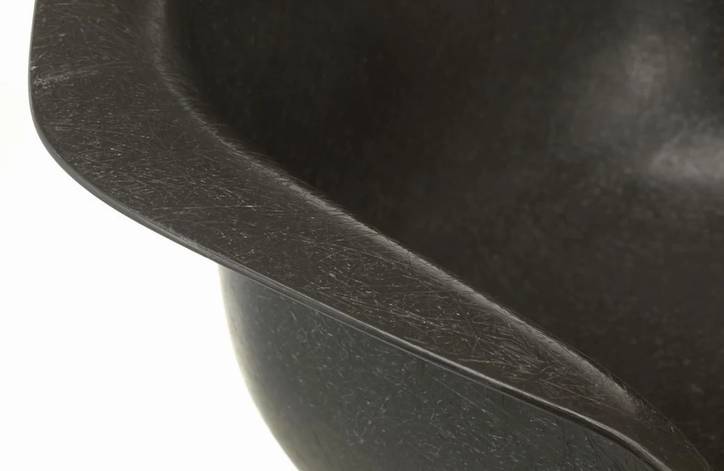 Close view of the rim of a fibreglass armchair shell
