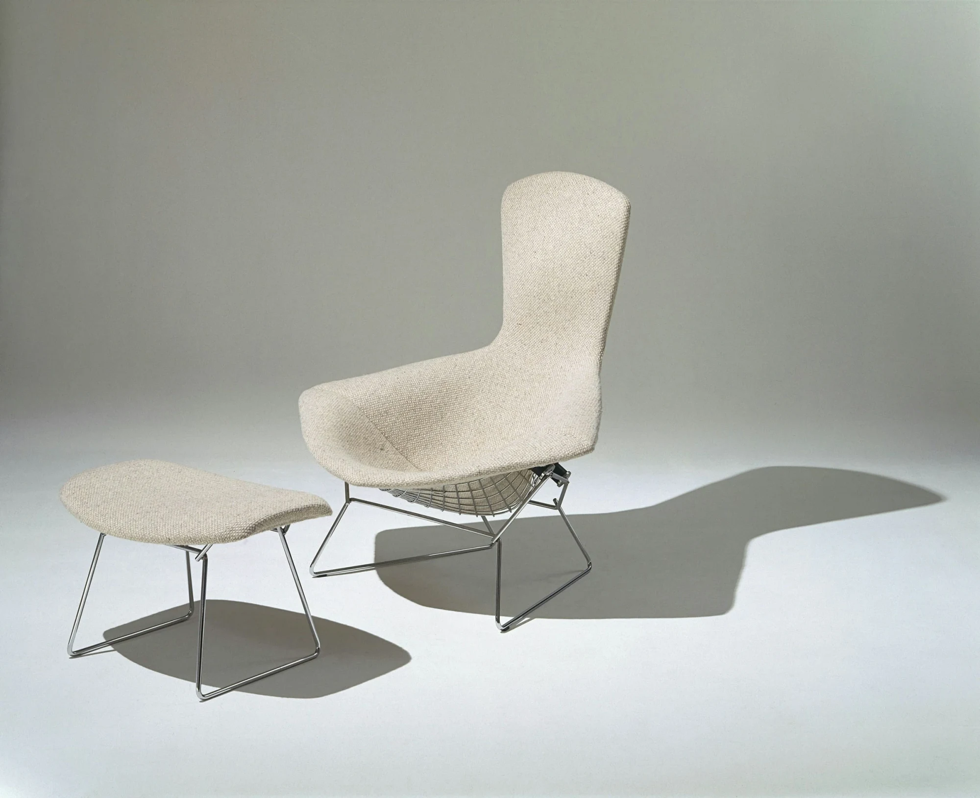 Bertoia Bird Chair and ottoman in a studio, Knoll picture 3776