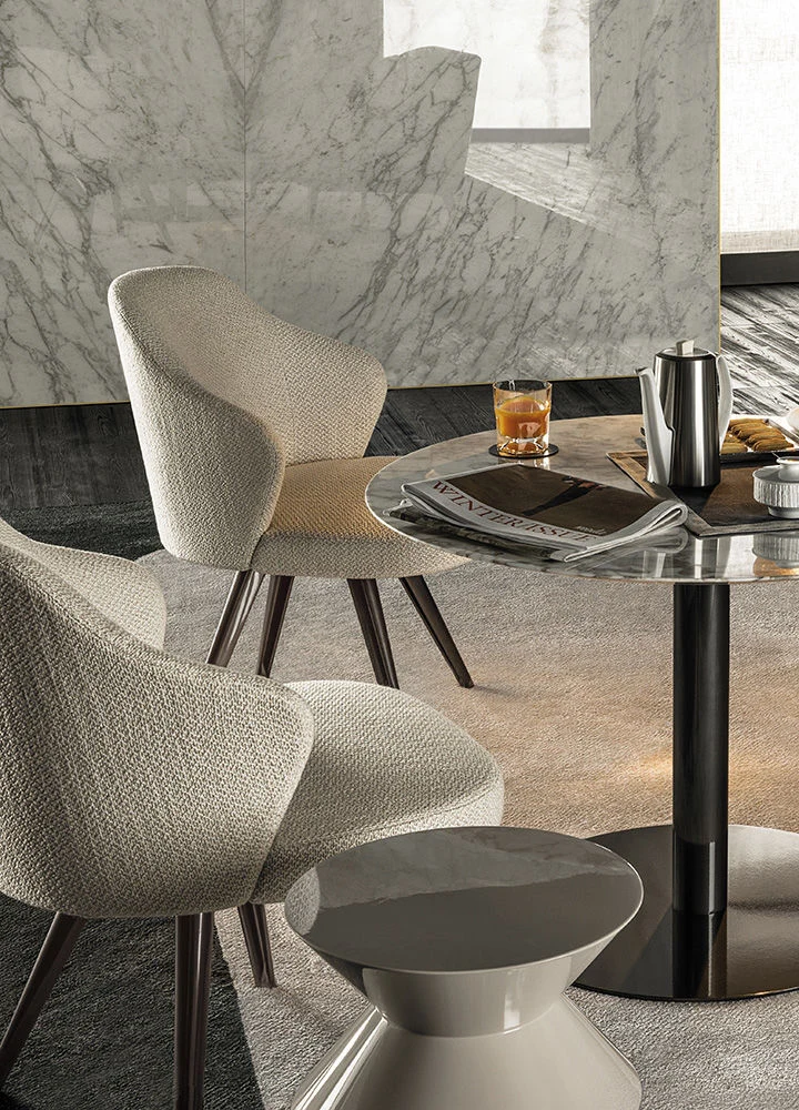 Two Leslie Lounge chairs in an official Minotti composition