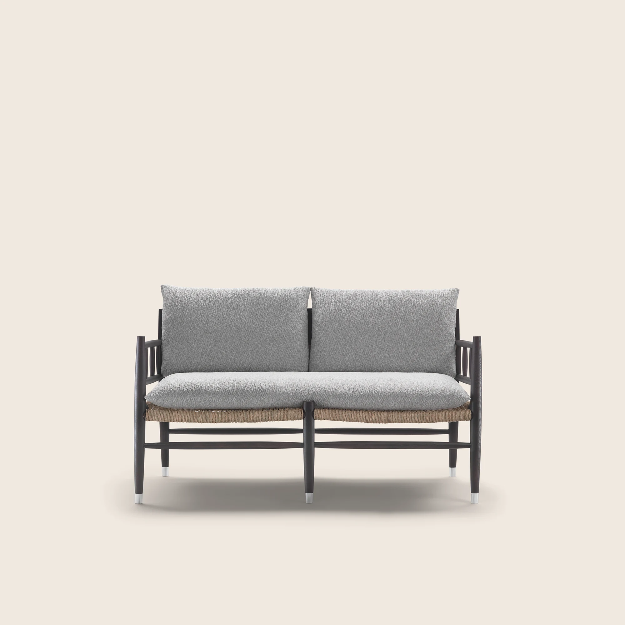 Front view of the Lee sofa with two soft cushions, plain background