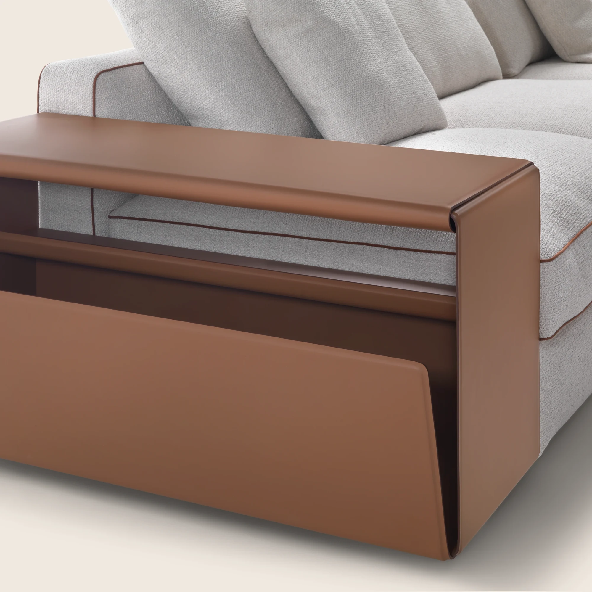 Close view of a cowhide console armrest beside seat and back cushions