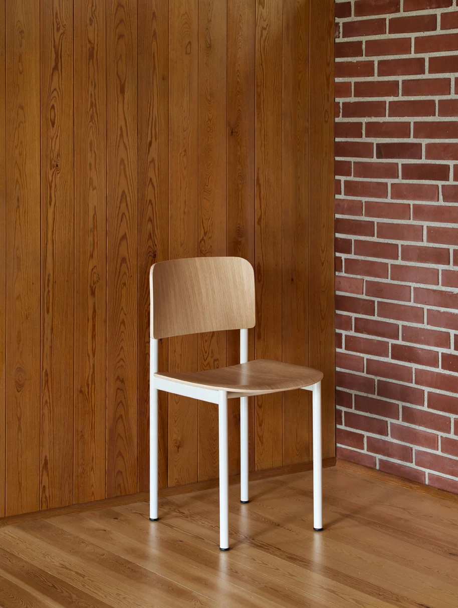 Plan Chair with a chalk frame in a room, lifestyle image from the product page