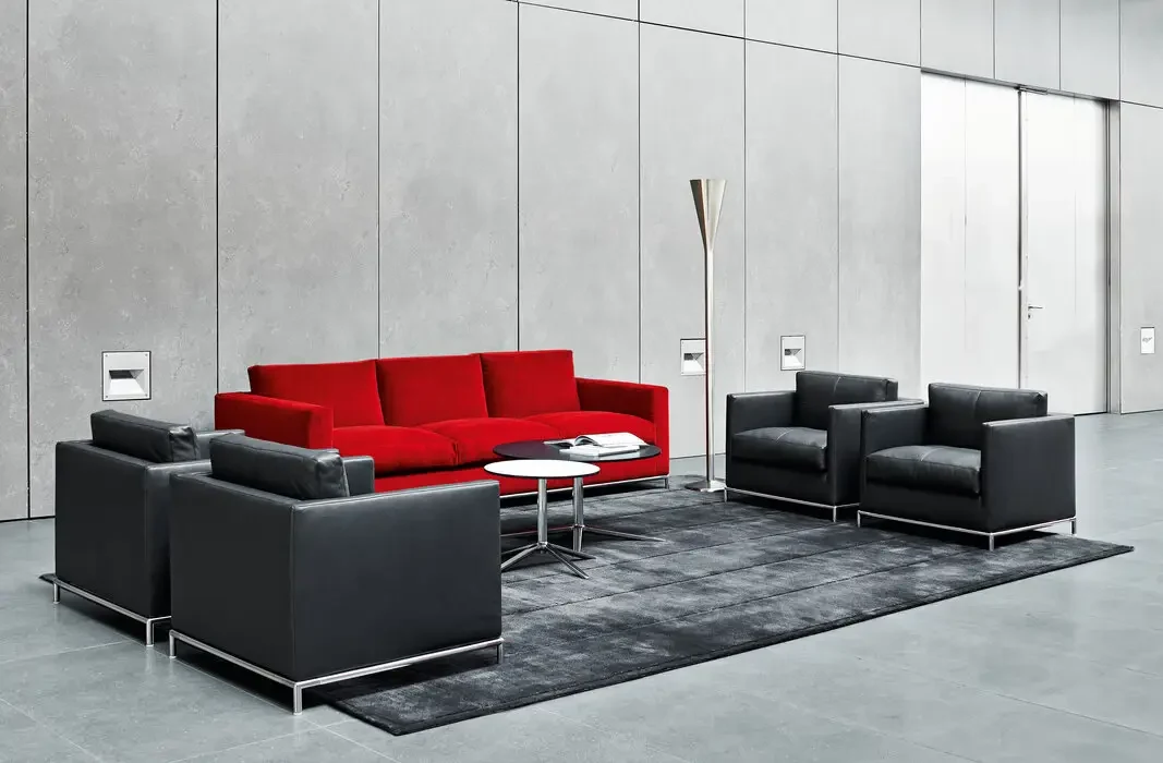 A sofa with armchairs in a wide-format official picture