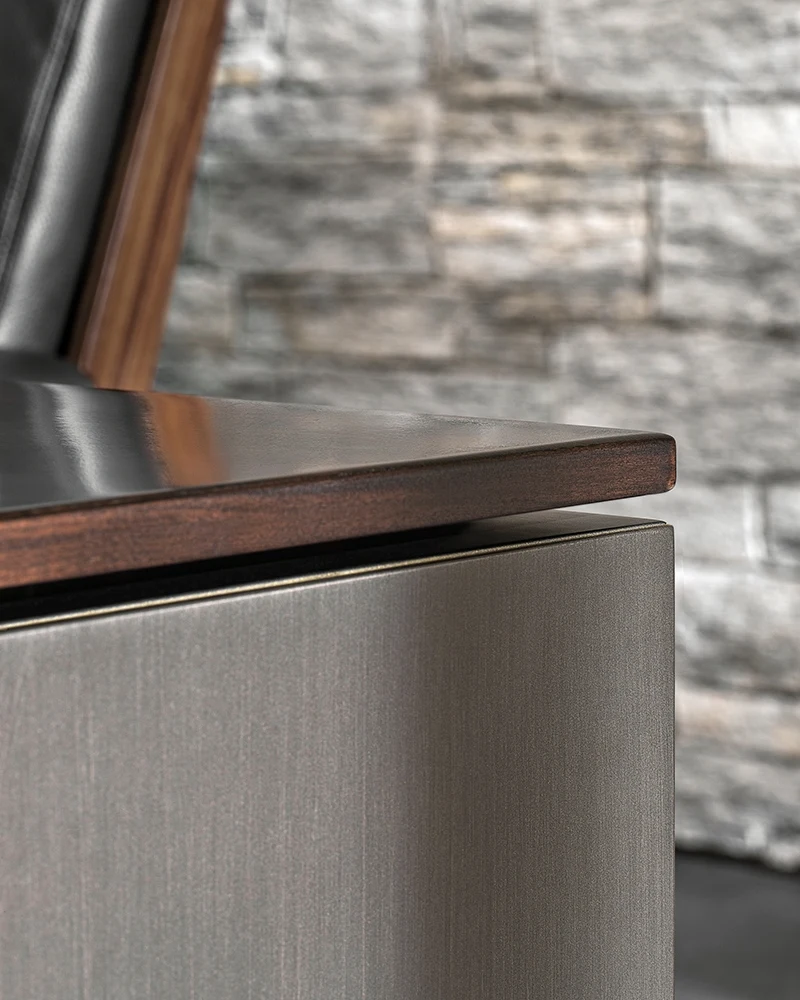 Close view of Linha Studio's drawers and metal-edged structure