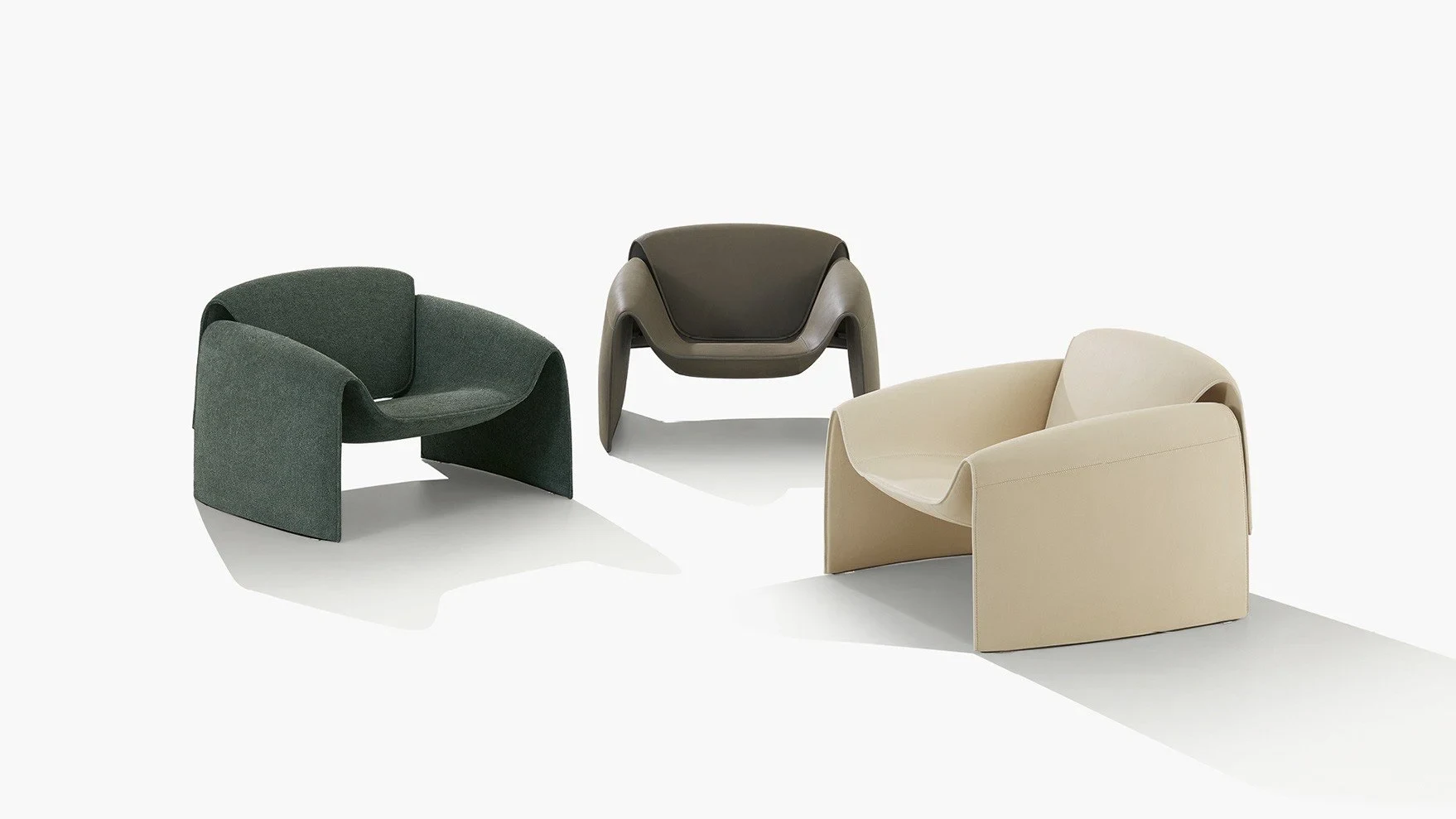 Trois fauteuils Le Club, photo officielle du studio Poliform