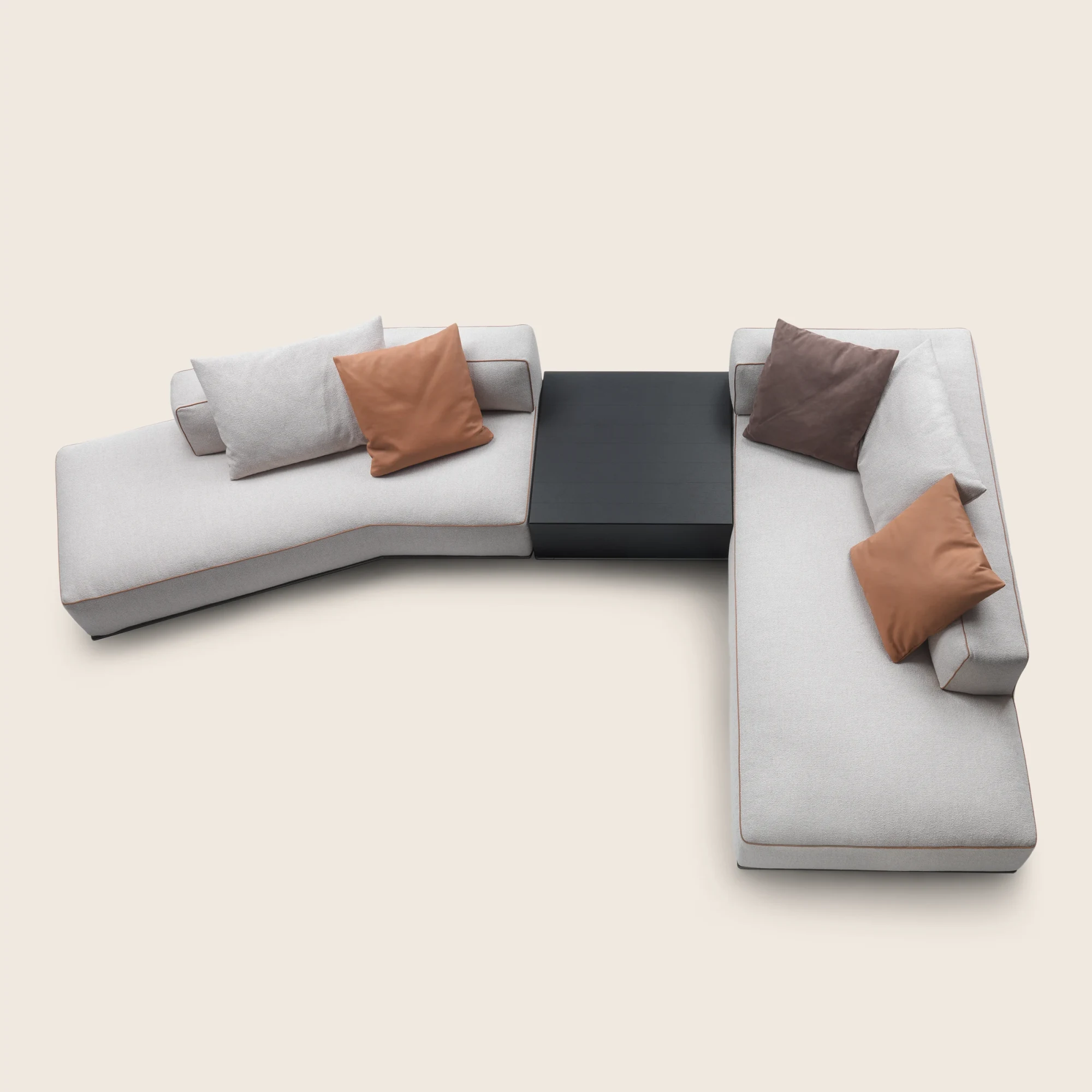 Perry coffee table placed between two seating modules
