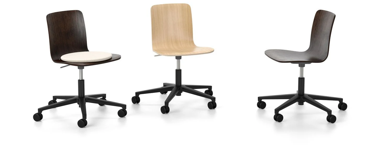 Swivel chairs on five-star bases, seen from different sides on a plain background