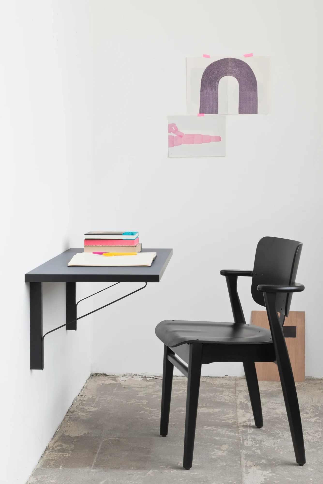 Kaari Wall Console used as a small desk beside a chair