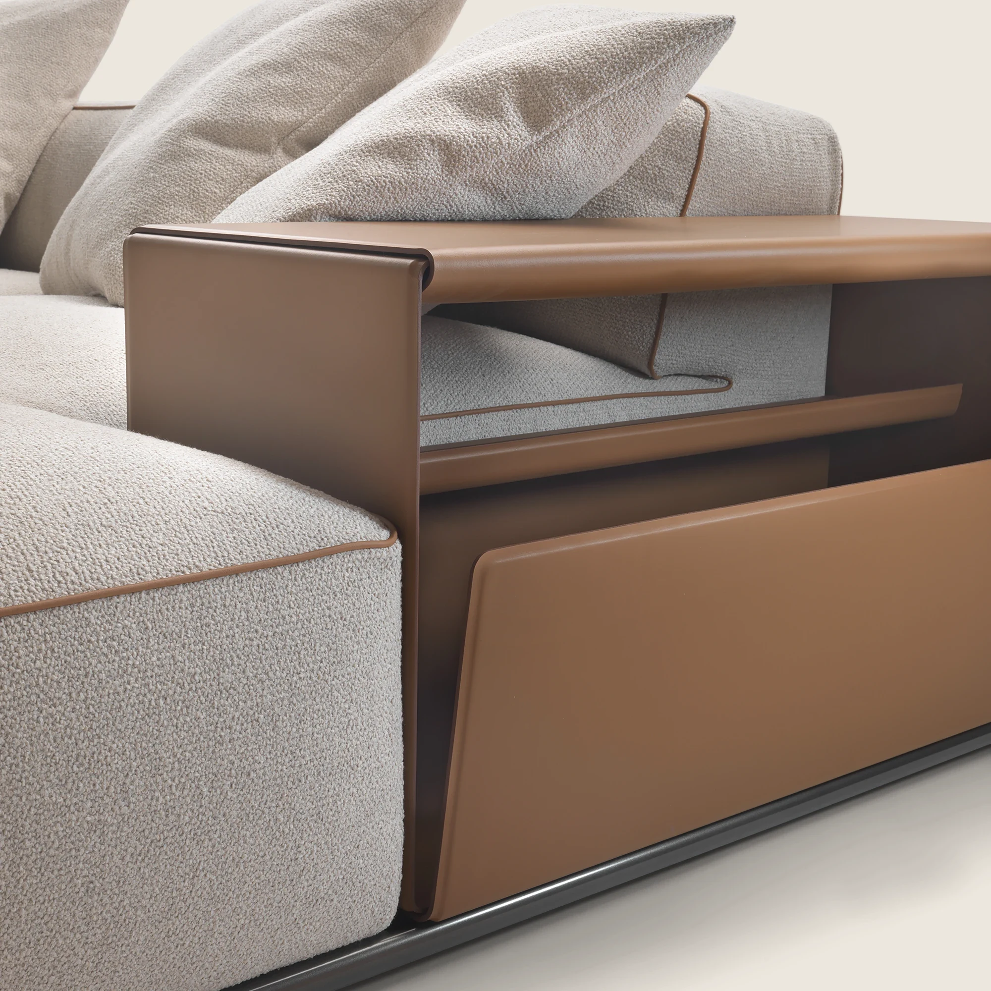 Close view of a storage armrest beside a seat module