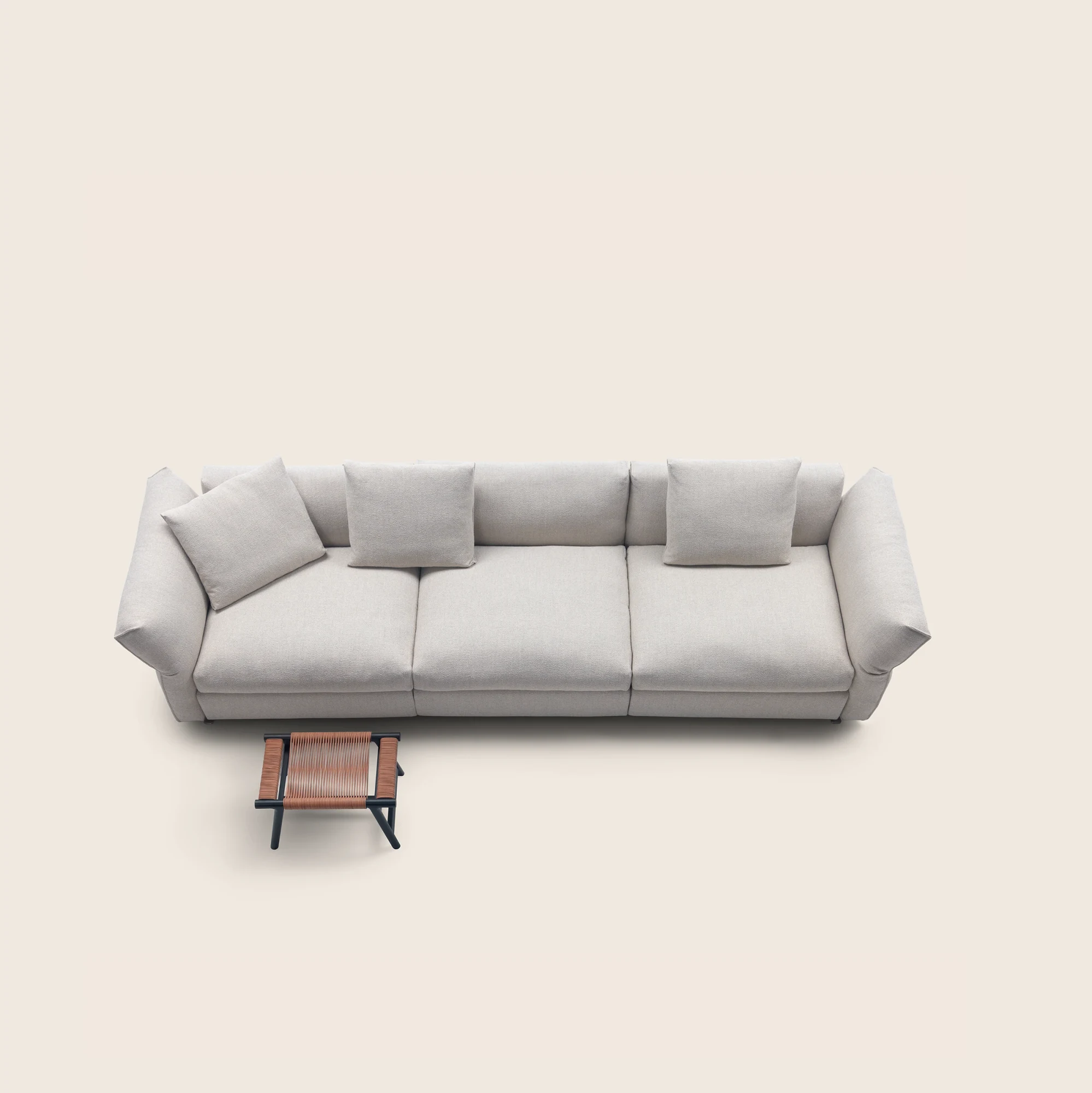 Top view of a three-part sofa with a small table at the front