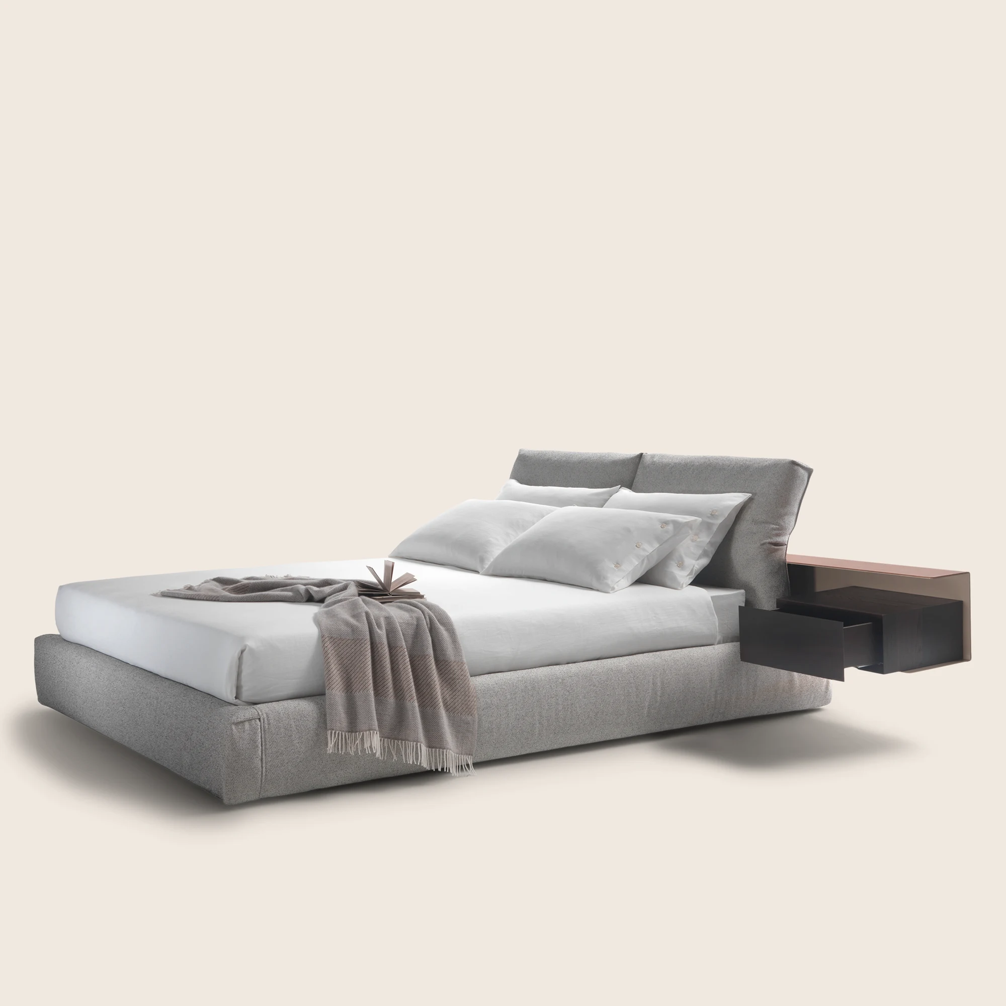 Newbridge bed in a three-quarter view with a throw over the foot
