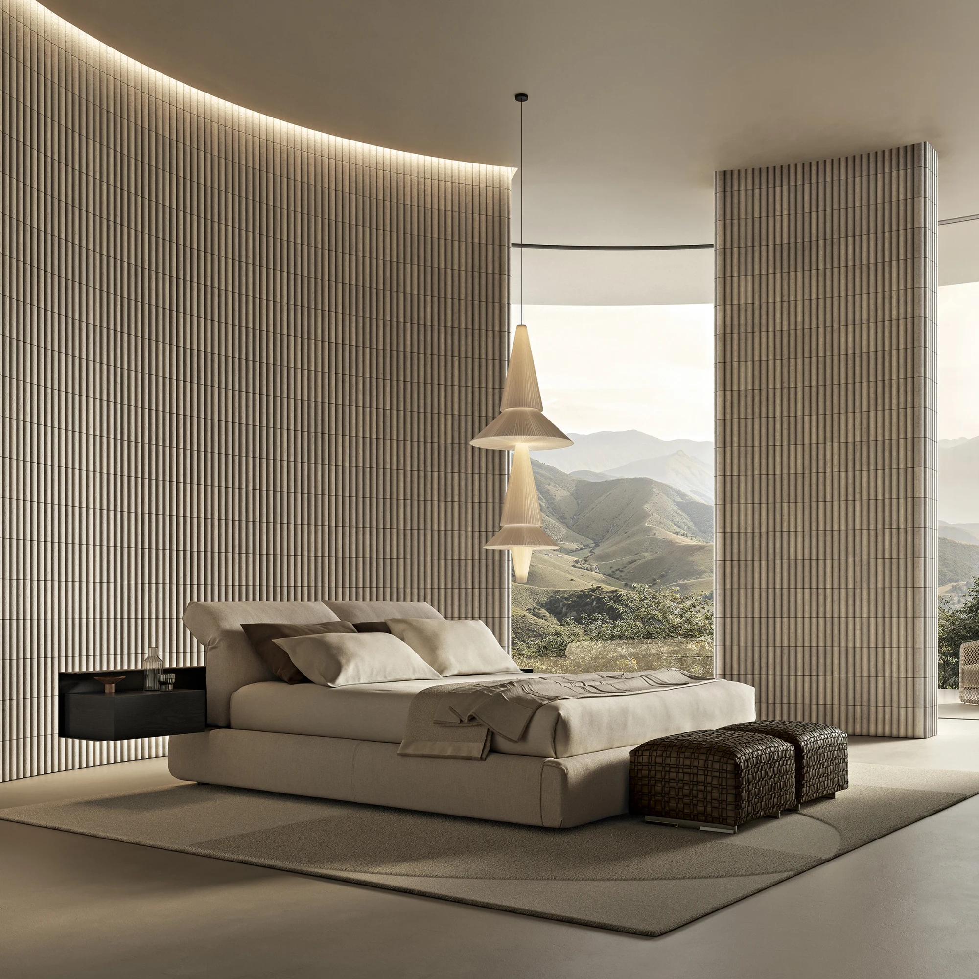 Newbridge bed in a bedroom with a curved wall behind it and a hanging lamp