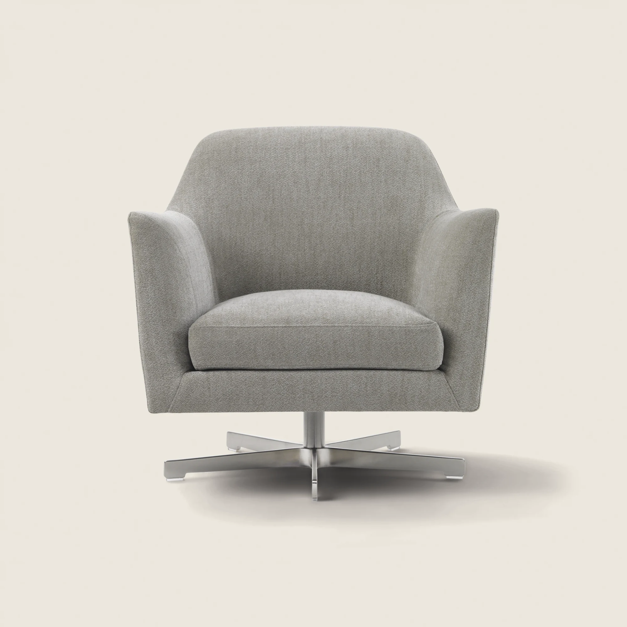 Front view of the Luce armchair on a swivel metal base, plain background