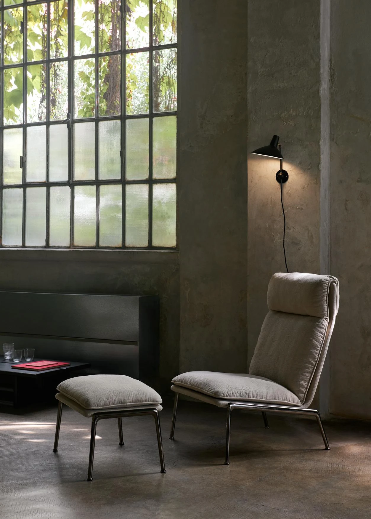 Muno LN16 with the LN20 footstool in a room
