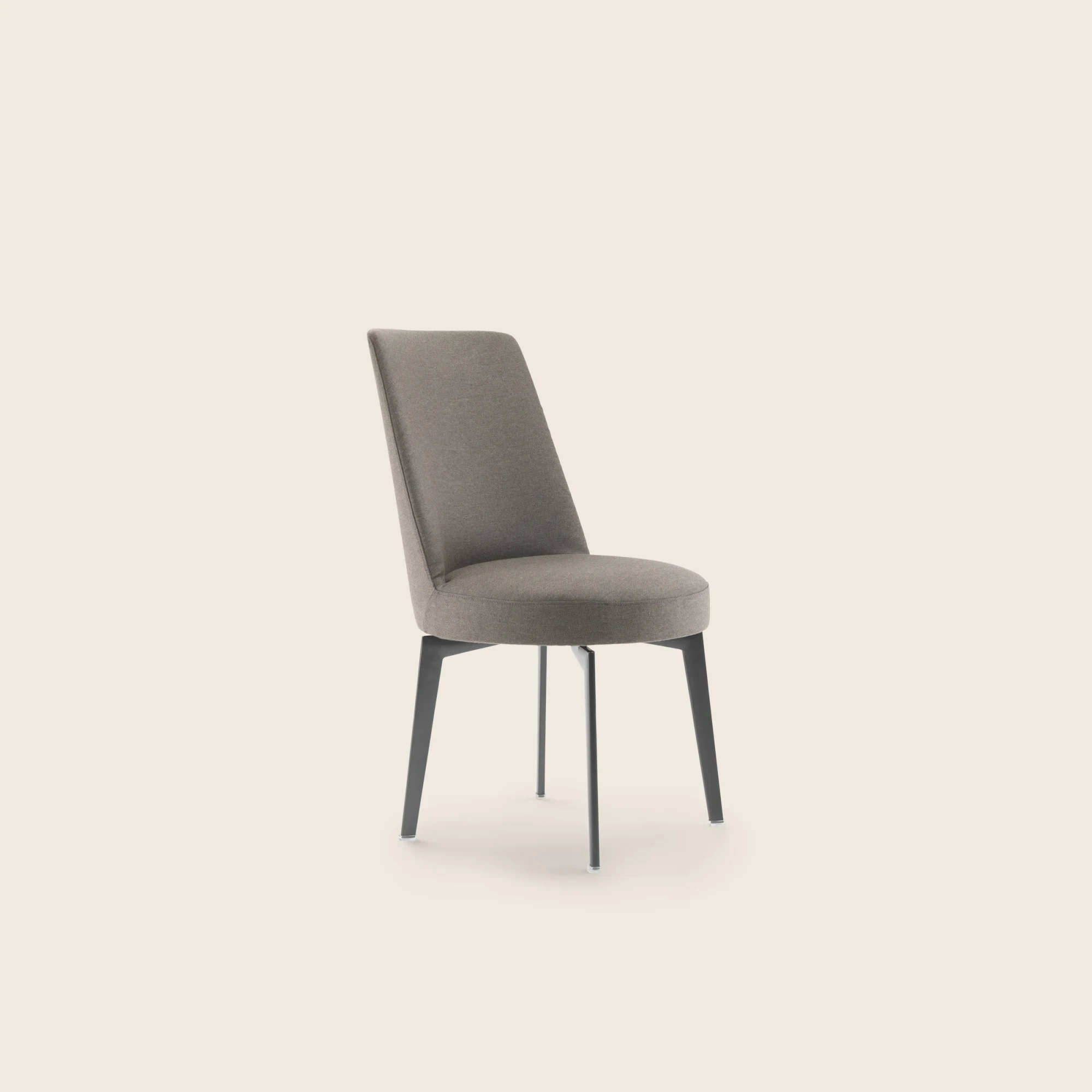 Hera armless chair viewed from a front three-quarter angle on a plain background