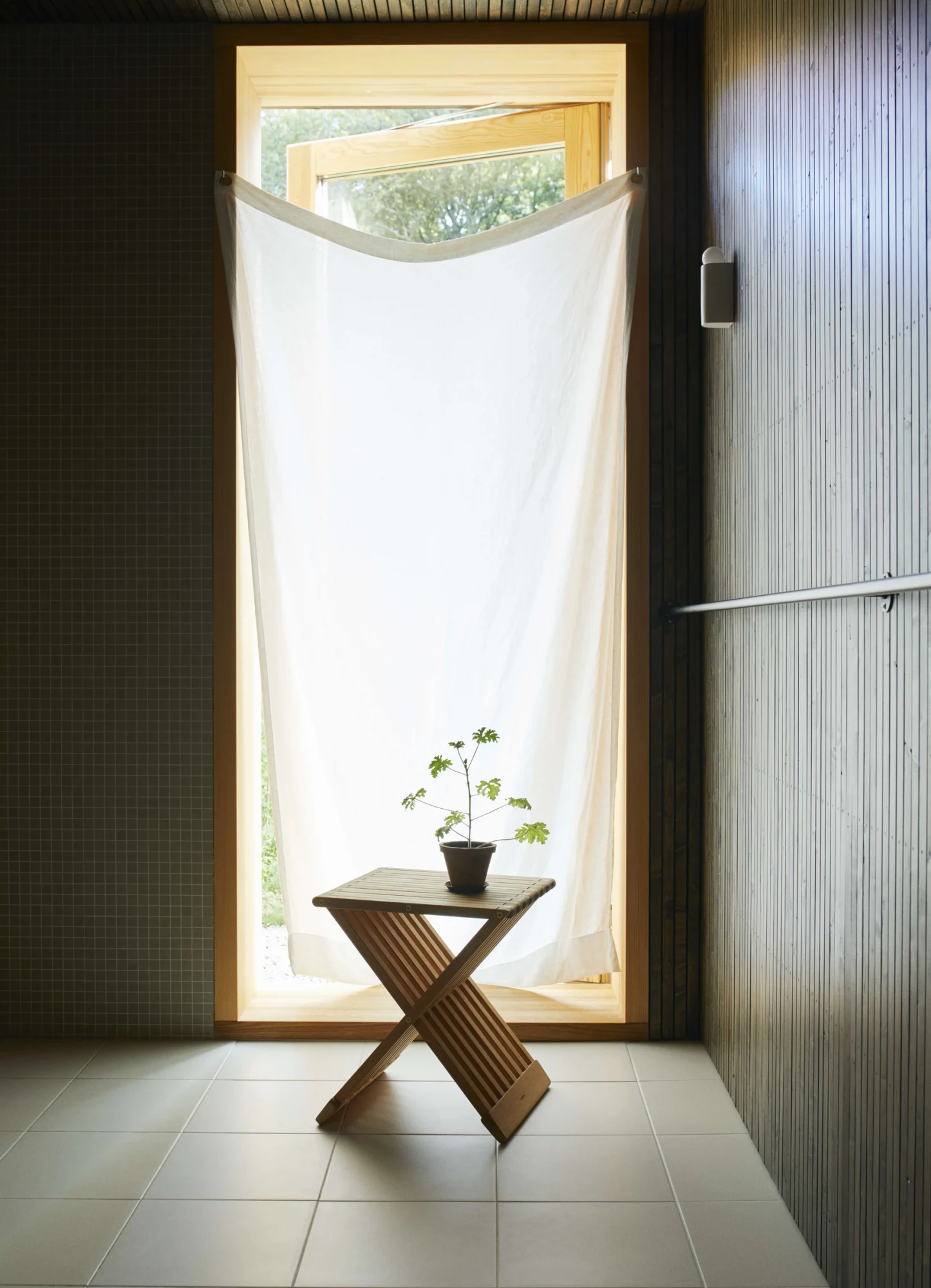 Fionia Stool in a styled photograph from the product page